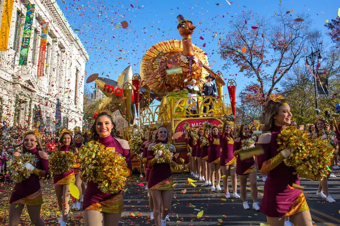 The Thanksgiving Parade Turkey float and cheerleaders during the 2018 parade